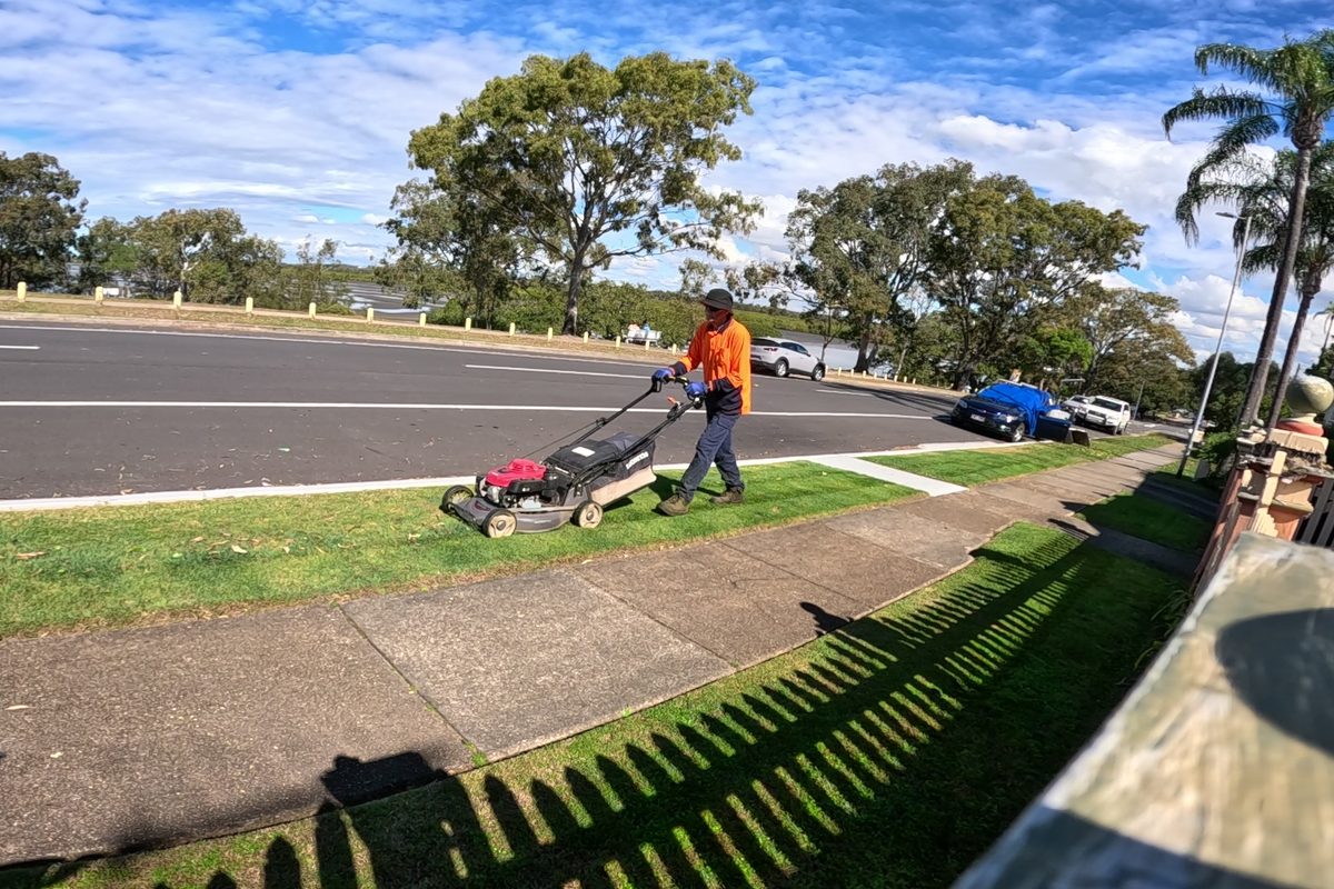 Mowing a residential nature strip