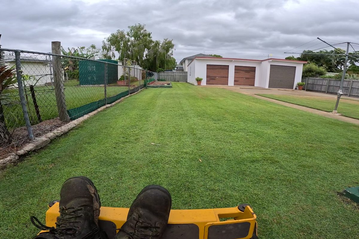 Ride-on mowing on an open lawn